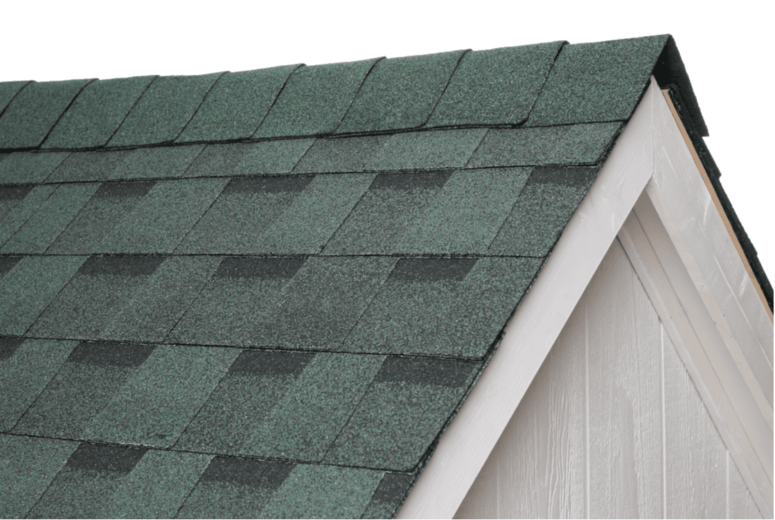 Close-up of green architectural shingles on a gable roof